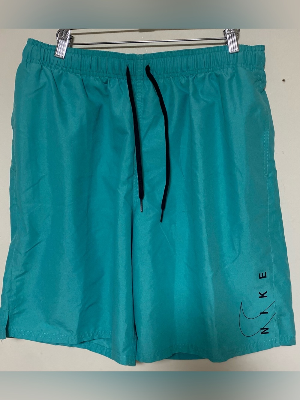 Nike Turquoise Athletic Mesh Shorts with Black Logo Tag